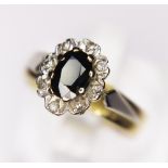 DIAMOND CLUSTER RING. 18ct gold vintage 1979 sapphire and diamond cluster ring, size I