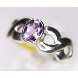 SILVER AND AMETHYST RING. 925 silver twist ring set with amethyst, size Q