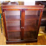 BOOKCASE. Mahogany glazed bookcase, 82 x 27 x 102cm