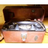 CASED FIELD TELEPHONE. Wooden box with miscellaneous contents and cased field telephone