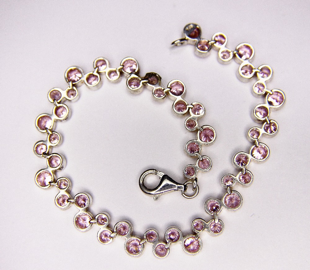 SILVER BRACELET. Sterling silver pink stone set bracelet