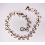 SILVER BRACELET. Sterling silver pink stone set bracelet