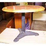 PEDESTAL TABLE. Circular pedestal table with cast iron base