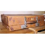 LEATHER SUITCASE BY REVELATION. Antique Revelation leather suitcase with travel stickers, 60 x