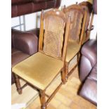 DINING CHAIRS. Three heavy Dutch style uphlstered dining chairs including one carver