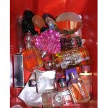 Box of mixed part filled perfumes