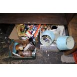 Three boxes of household items including lamps, ceramics and brass