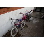 Three childrens bicycles