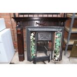 Victorian cast iron fire surround and a wooden example