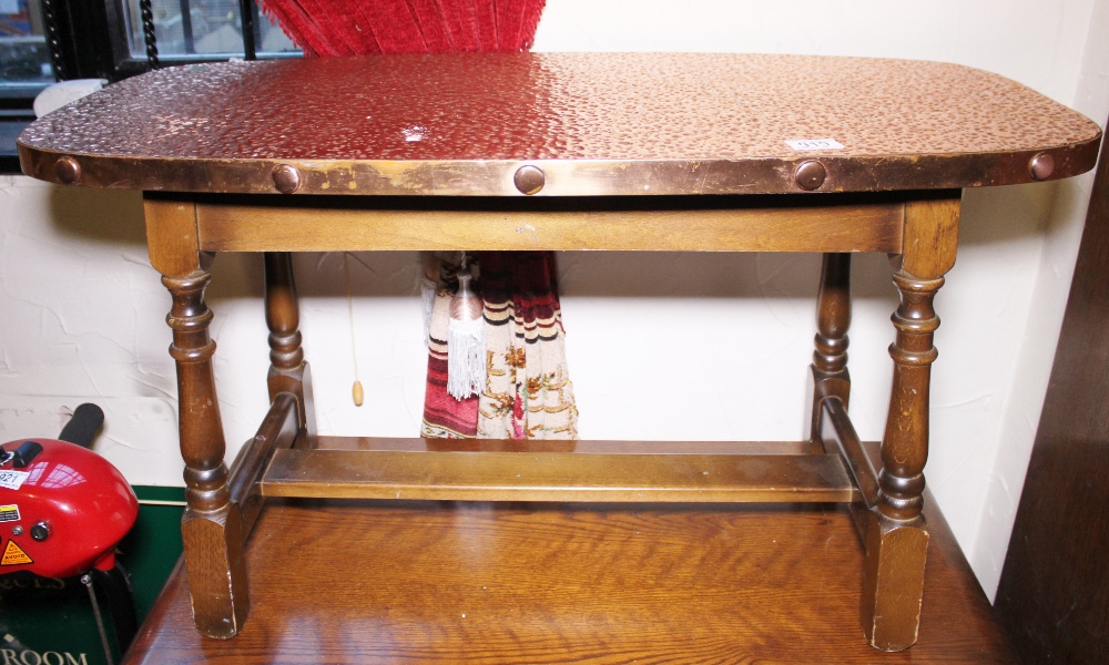 Copper topped mahogany coffee table with stretcher, L ~ 90cm