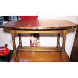 Copper topped mahogany coffee table with stretcher, L ~ 90cm