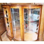 Flame mahogany display cabinet on cabriole supports