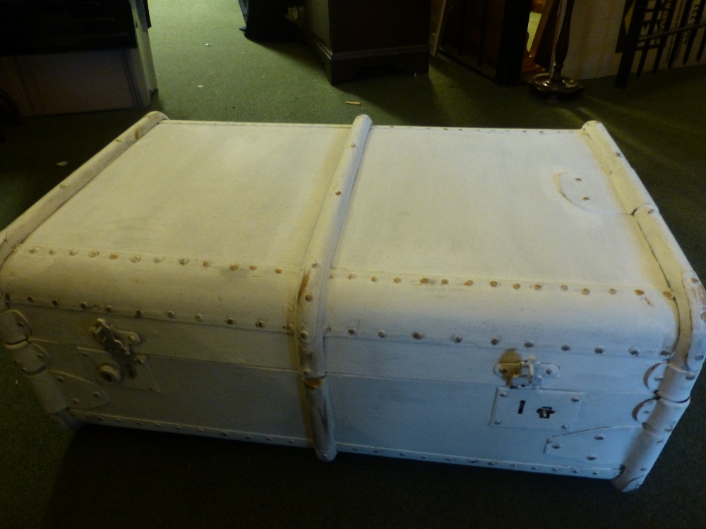 Painted white travel trunk