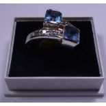 Sterling silver two stone blue topaz ring, size P