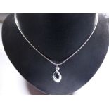 Silver pendant on silver chain