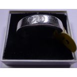 Sterling silver band with feature hallmark, size R