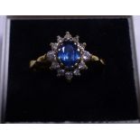 18ct gold diamond and sapphire cluster ring, sapphire approximately 0.88ct, diamond approximately