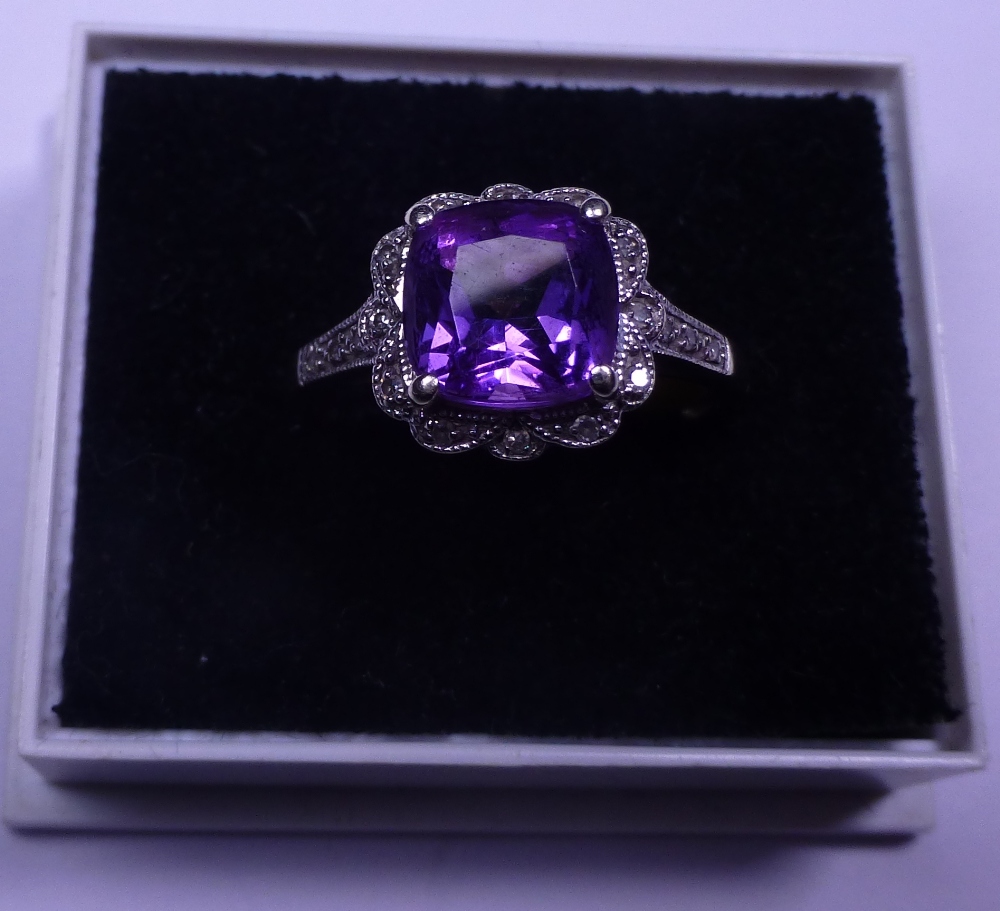 9ct white gold amethyst solitaire with diamond set mount, size K