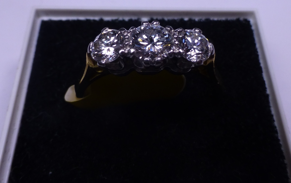 18ct gold 1.00ct three stone diamond ring, size N/O, RRP £3200