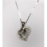 HEART PENDANT AND CHAIN. 18ct white gold stone set heart pendant on 18ct white gold necklace