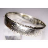 SILVER BANGLE. Sterling silver vintage 1977 engraved bangle