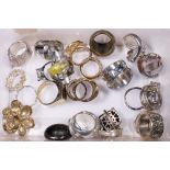 MIXED RINGS. Box of costume jewellery rings