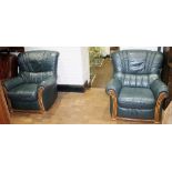 ARMCHAIRS. Pair of green leather armchairs