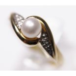 9CT GOLD PEARL SOLITAIRE. 9ct gold real pearl solitaire ring with diamond shoulders, size O