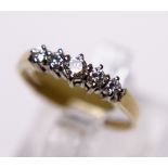 18CT GOLD HALF ETERNITY RING. 18ct gold five stone diamond half eternity ring, size L/M