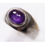 SILVER SOLITAIRE RING. Sterling silver thick set purple stone solitaire ring, size Q