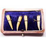 IVORY AND PRESUMED GOLD CUFFLINKS. Pair of ivory and presumed gold cufflinks in original case