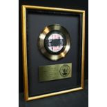 WINGS - RIAA gold disc award presented t