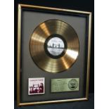 WINGS - RIAA gold disc award presented t