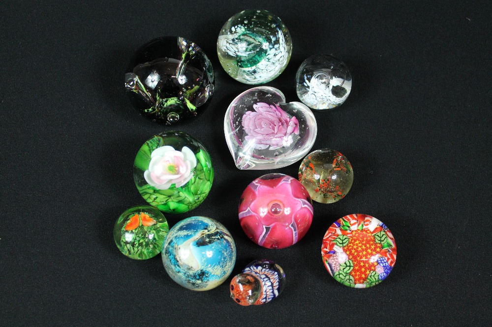 GLASS PAPERWEIGHTS - a collection of eleven glass paperweights to include Caithness paperweights x3