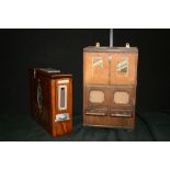 CIGARETTE VENDING MACHINES - A wooden Wills Woodbine counter top cigarette vending machine with 2
