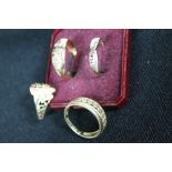 RINGS - a collection of four gold rings to include a 9k gold leaf ring,