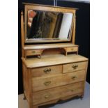 CHEST OF DRAWERS AND MIRROR SET - a Edwardian wooden chest of drawers c1910,