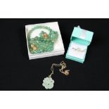 JADE NECKLACE AND ACCESSORIES SET - a jadite beaded necklace and earring set with pearl shaped