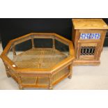 CUPBOARD AND COFFEE TABLE - a Moroccan style squat cupboard and octagon rattan coffee table.