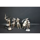 METAL FIGURES - A group of 4 brass musicians and two further figures.