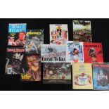 FILM BOOKS AND PROGRAMMES - a collection of film books and programmes x12 to include Moonraker,