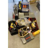 TOOLS - A mixed lot of unused and used hand tools, tool bags and boxes, a jump start,