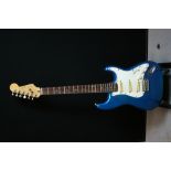 SQUIRES STRATOCASTER - a Squires Stratocaster by Fender, blue and white, in hard guitar case.