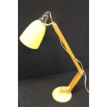 MAC LAMP - A yellow shade and base Mac Lamp with a wooden skeletal frame, Bakelite gimbal.