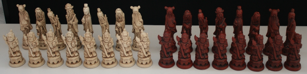 JAPANESE CHESS SET - a full chess set of Japanese red and white figures made from resin.