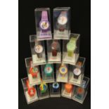 POP ART CHAOS WATCHES - A collection of 14 cased pop watches individually in a perspex case by