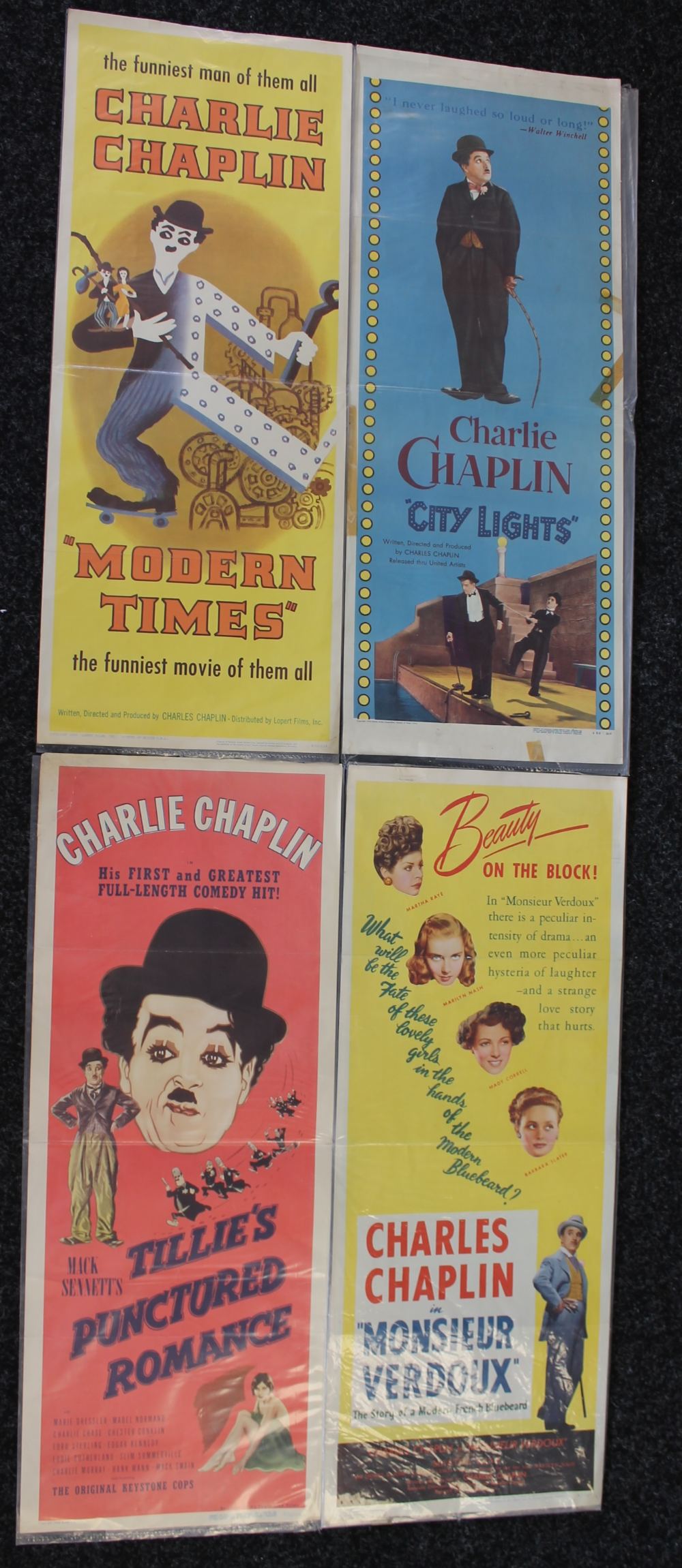 CHARLIE CHAPLIN - a collection of 4 Charlie Chaplin inserts measuring 36" x 14".