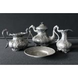 BRITANNIA METAL - matching florally embellished Britannia Ware items to include a tea pot,