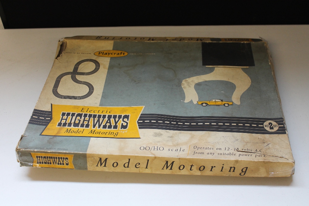 MODEL MOTORING - a Playcraft electric highways model motoring set.