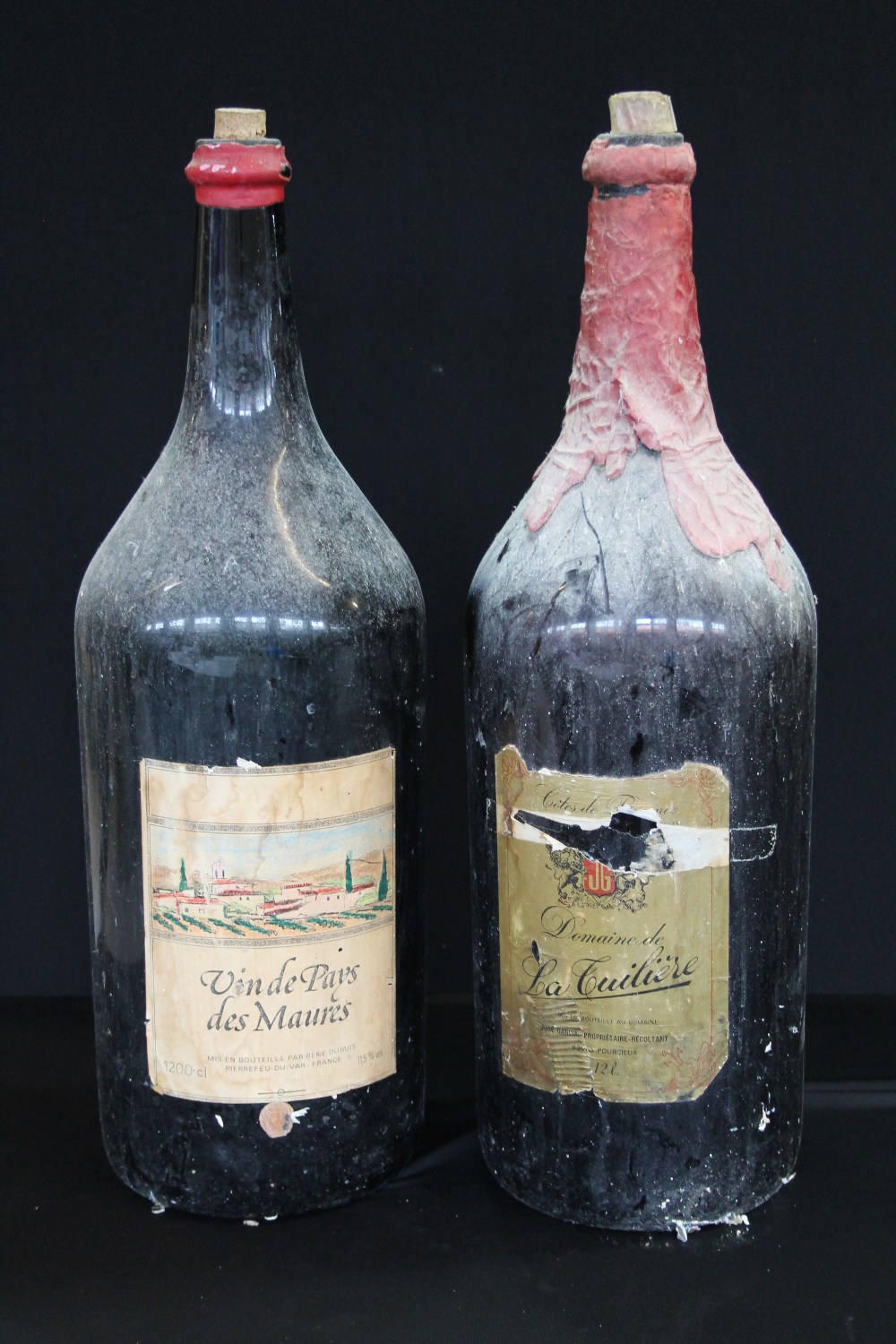 TWO 1200CL BOTTLES - two empty vintage French 1200cl wine bottles, one brown Domaine de La Cuiliere,